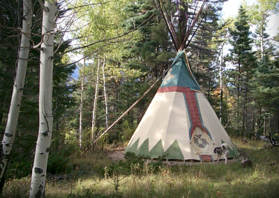 We worked with the traditional tipi design company – Nomadics Tipi Makers – to hand-paint authentic symbols of mountains, the zia and a raven on the east gate.
